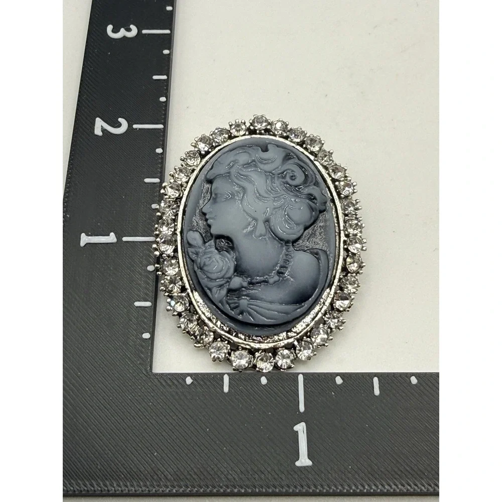 Vintage Cameo Brooch Black Resin Left Facing Silver Tone Rhinestone Surround